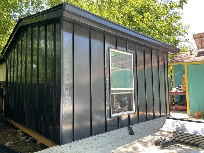 Black standing seam metal wall panels for Metal Roof Installation in Pinson