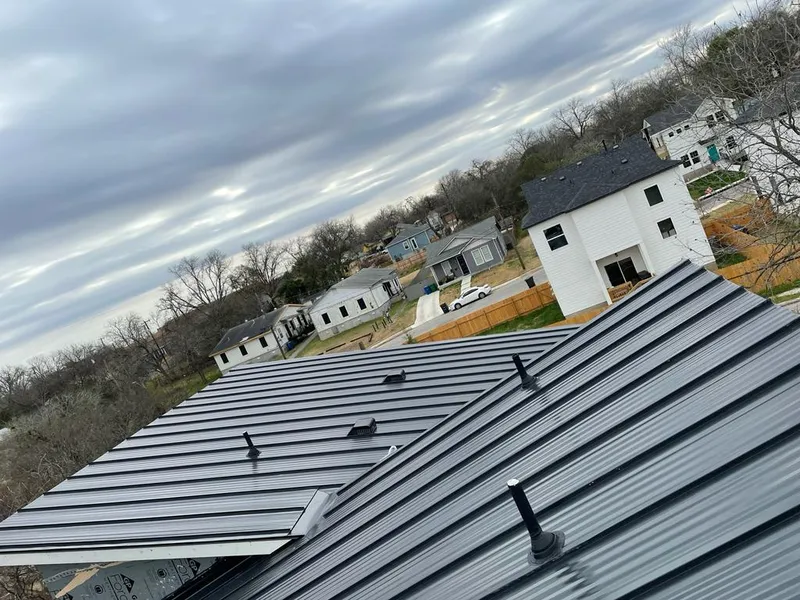 Standing seam metal roof panels with vents for Skylight Repair in Pinson